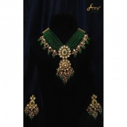 Anaghya Kundan Long Set With Green Beads For Formal Occasions